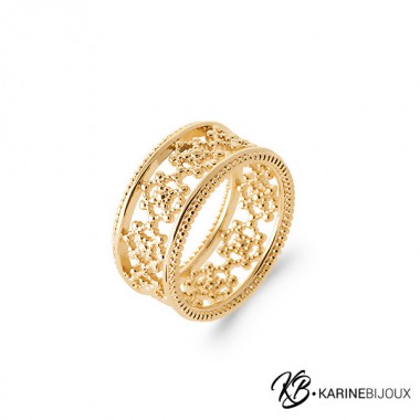 Anneau large fleurs perlées...